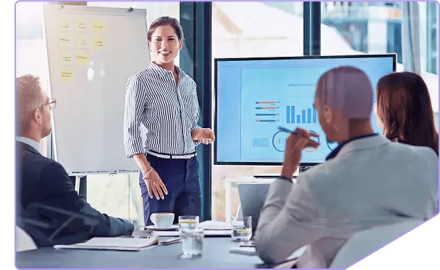 A woman presenting to a group.